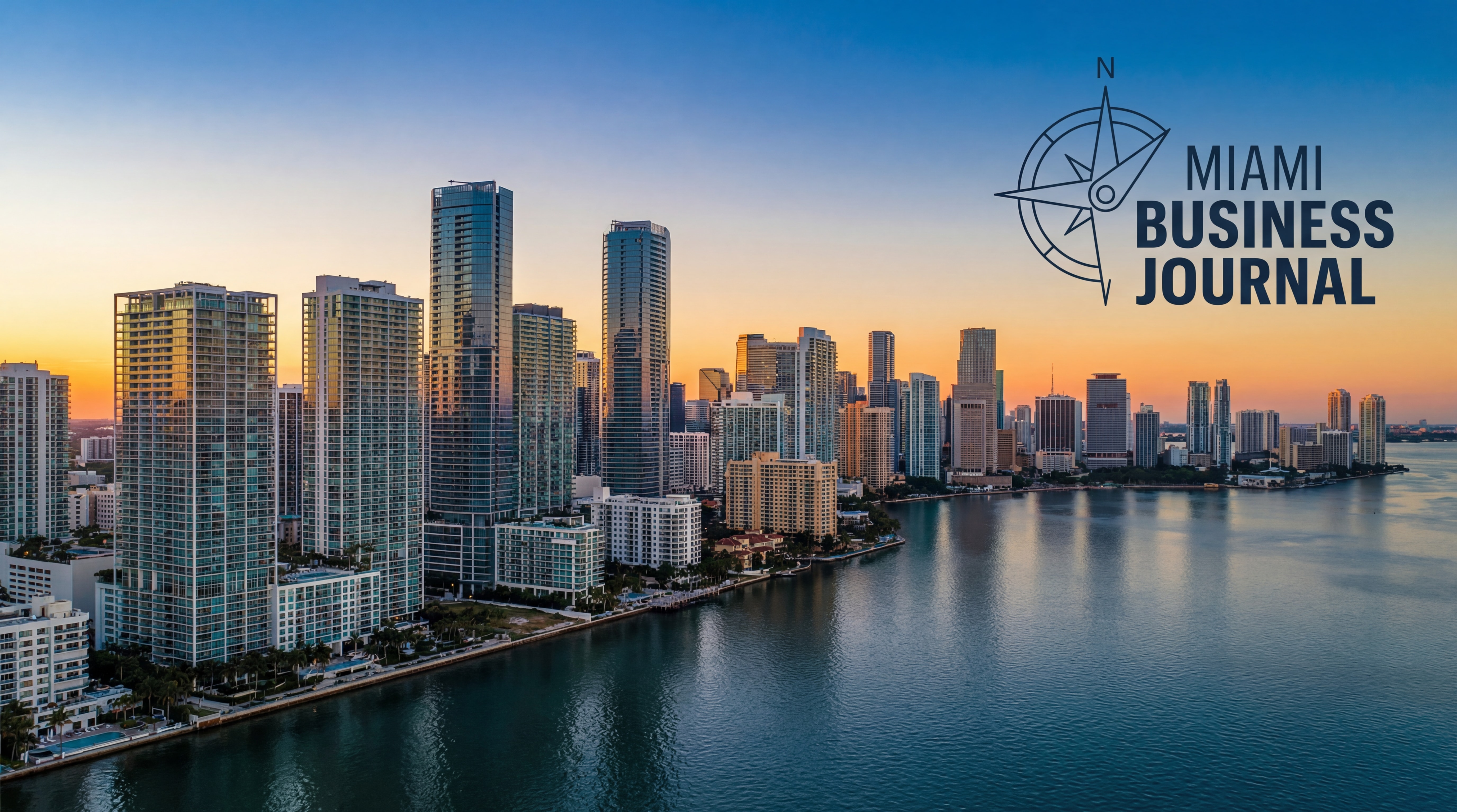 Stunning aerial view of Miami's Brickell skyline at golden hour with Biscayne Bay waterfront luxury towers reflecting in the water