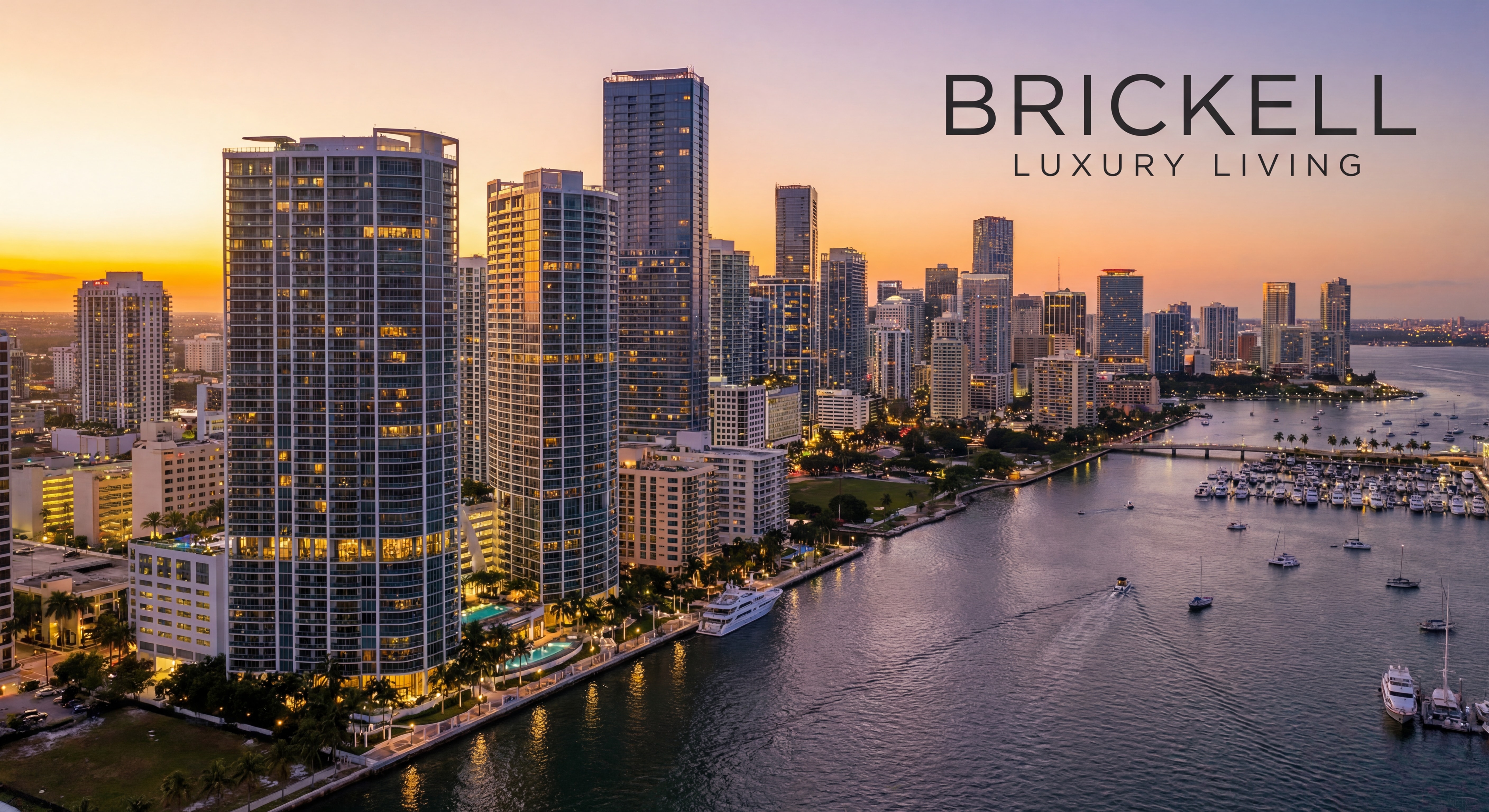 Aerial view of Miami's Brickell skyline at sunset with luxury high-rise towers and Biscayne Bay waterfront