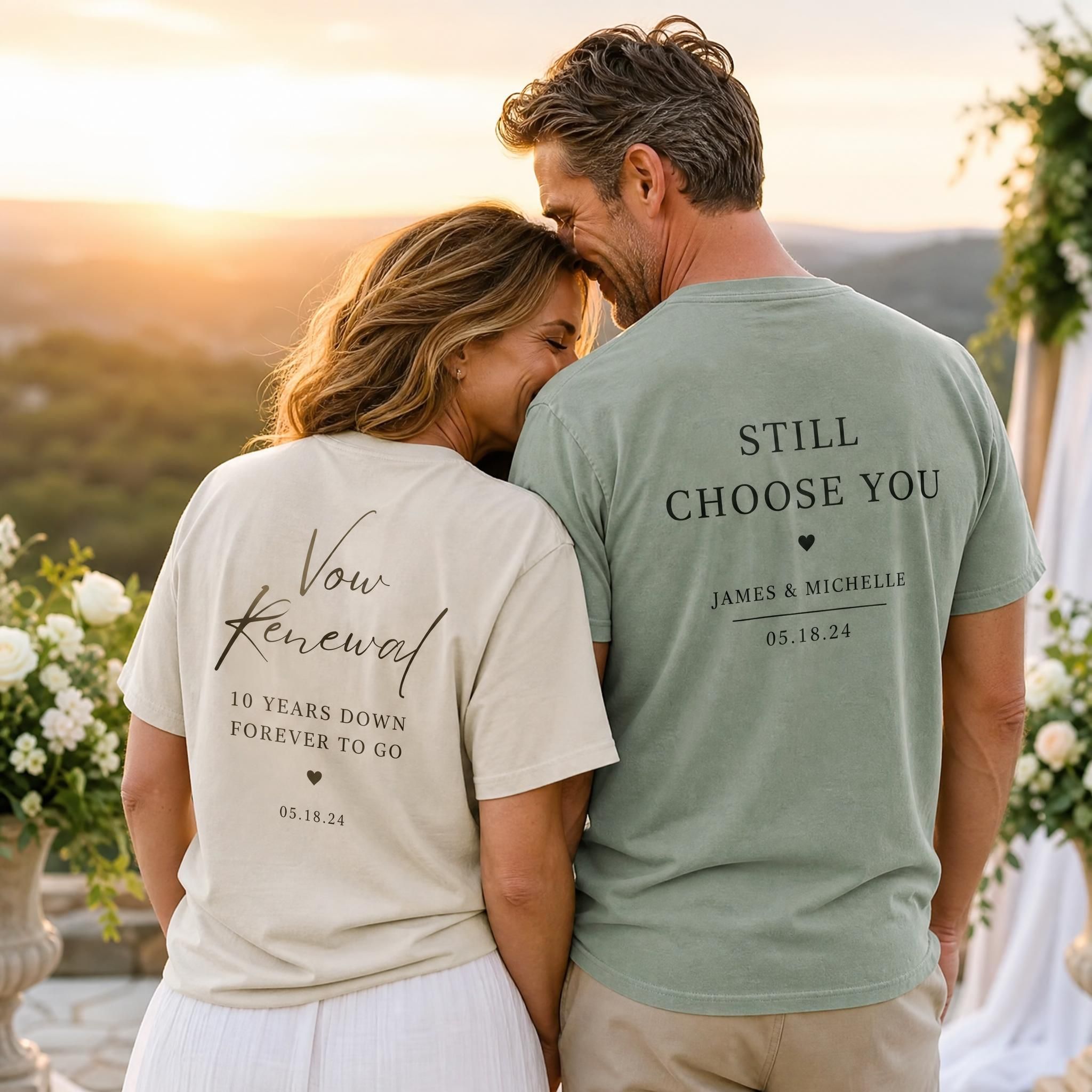 Couple in soft Comfort Colors personalized anniversary shirts during an outdoor vow renewal photoshoot, golden hour lighting