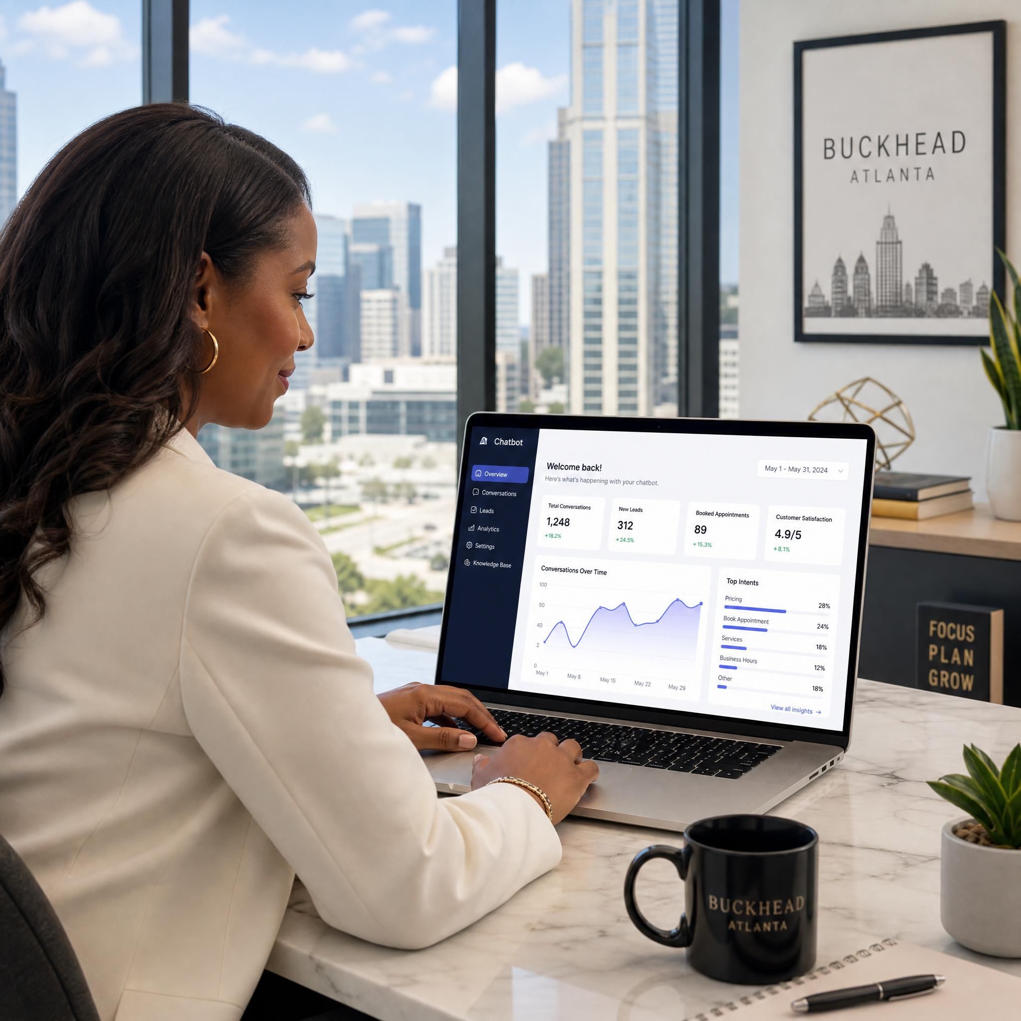 Atlanta small business owner reviewing AI chatbot dashboard on laptop in Buckhead office