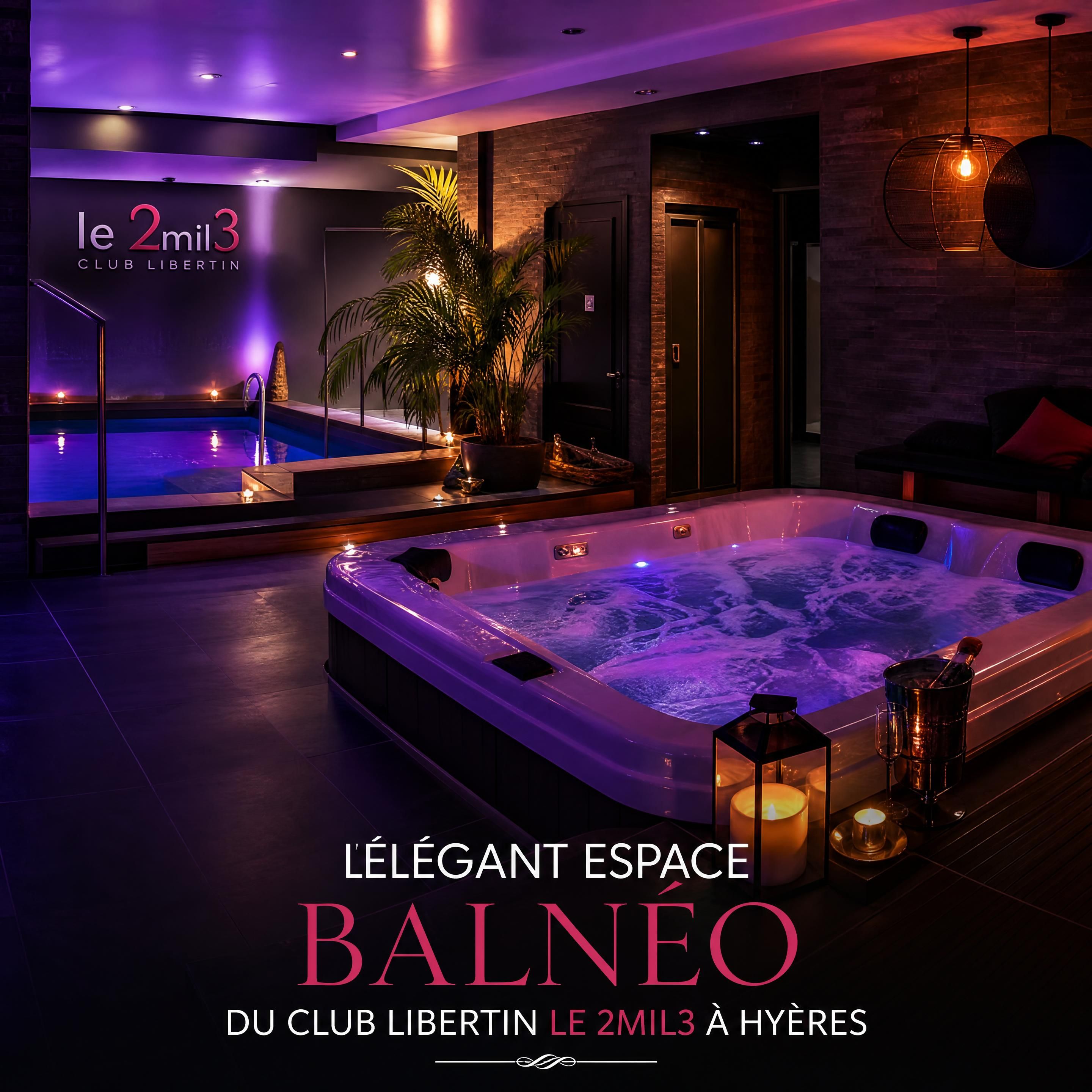 L'élégant espace balnéo illuminé de lumières tamisées au club libertin Le 2mil3 à Hyères